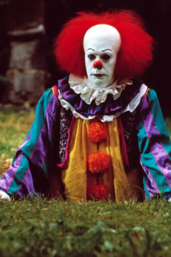 Tim Curry as Pennywise