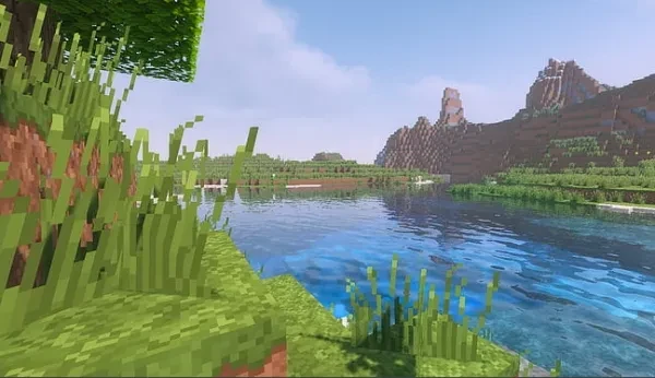 A beautiful lake under Minecrafts blue sky 