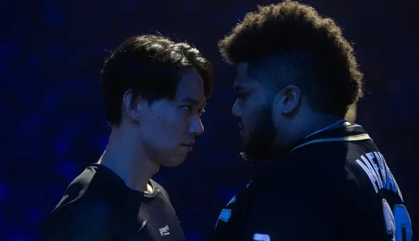 Tokido and MenaRD stare each other down before their big match at Evo 2023.