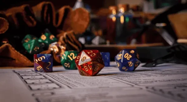 Every good build requires dice and a character sheet, which this image has!