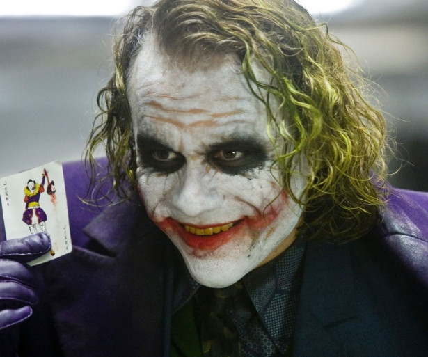 Joker with card